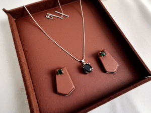 White Gold Plated Earrings And Pendent With Deep Green Glass Stones